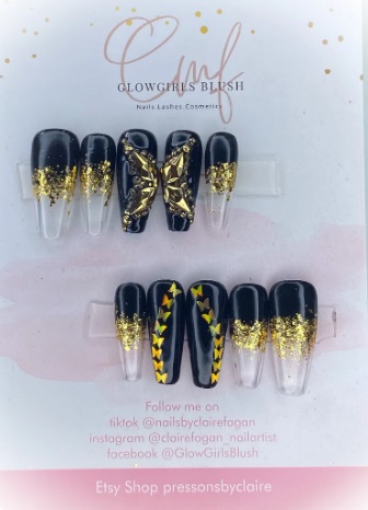 Conception d'ongles papillon or bling