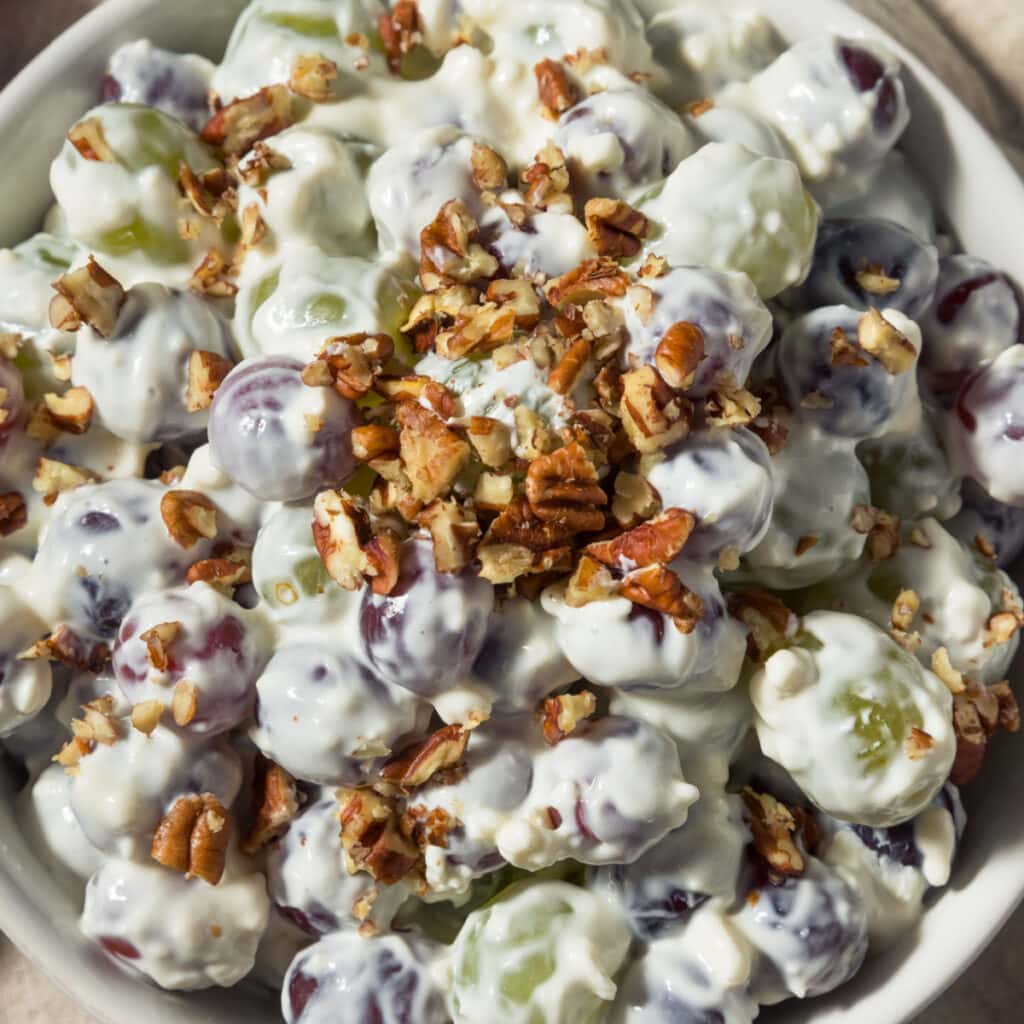 Creamy Grape Salad Topped with Crushed Pecans