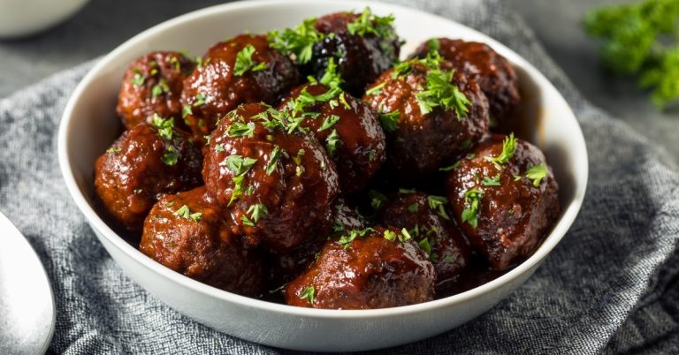 Homemade_Meatballs_With_BBQ_Sauce_In_A_White_Plate.jpg