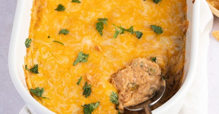 Delicious-Homemade-Texas-Trash-Dip-with-Refried-Beans-Green-Chiles-and-Cheese.jpg