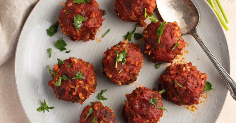Homemade-Appetizing-and-Saucy-Porcupine-Meatballs-with-Herbs.jpg