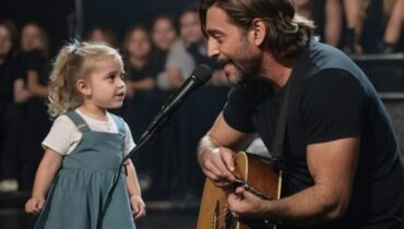 Une jeune prodige vocale éblouit la foule sur la scène d’une superstar.